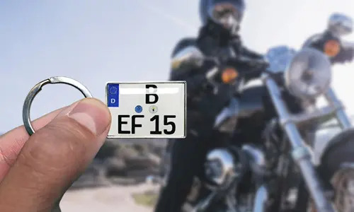 motorcycle keychain in hand